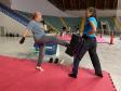 imagem mostra a prática do muay thai durante aula na escolinha de esporte no ginásio do tarumã